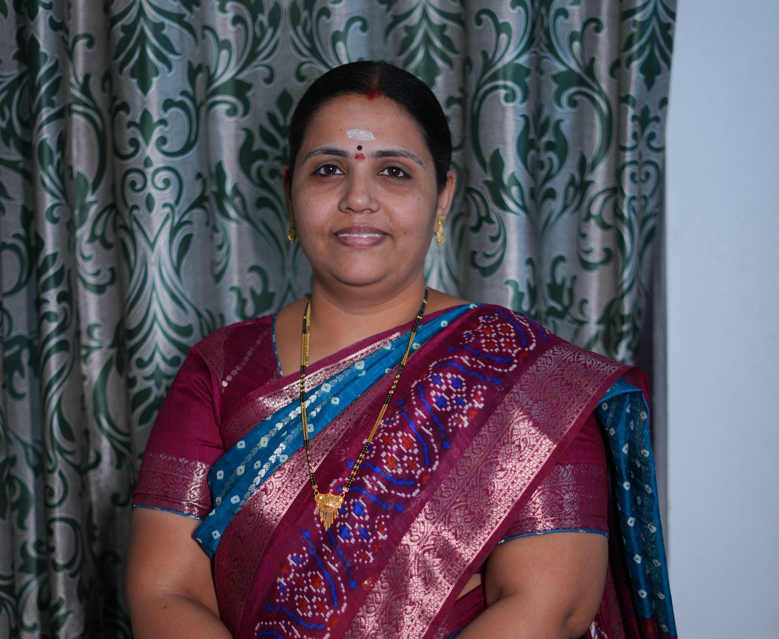 M. MANASA 